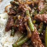asian beef strips with green beans onions 2026 07 04 125336