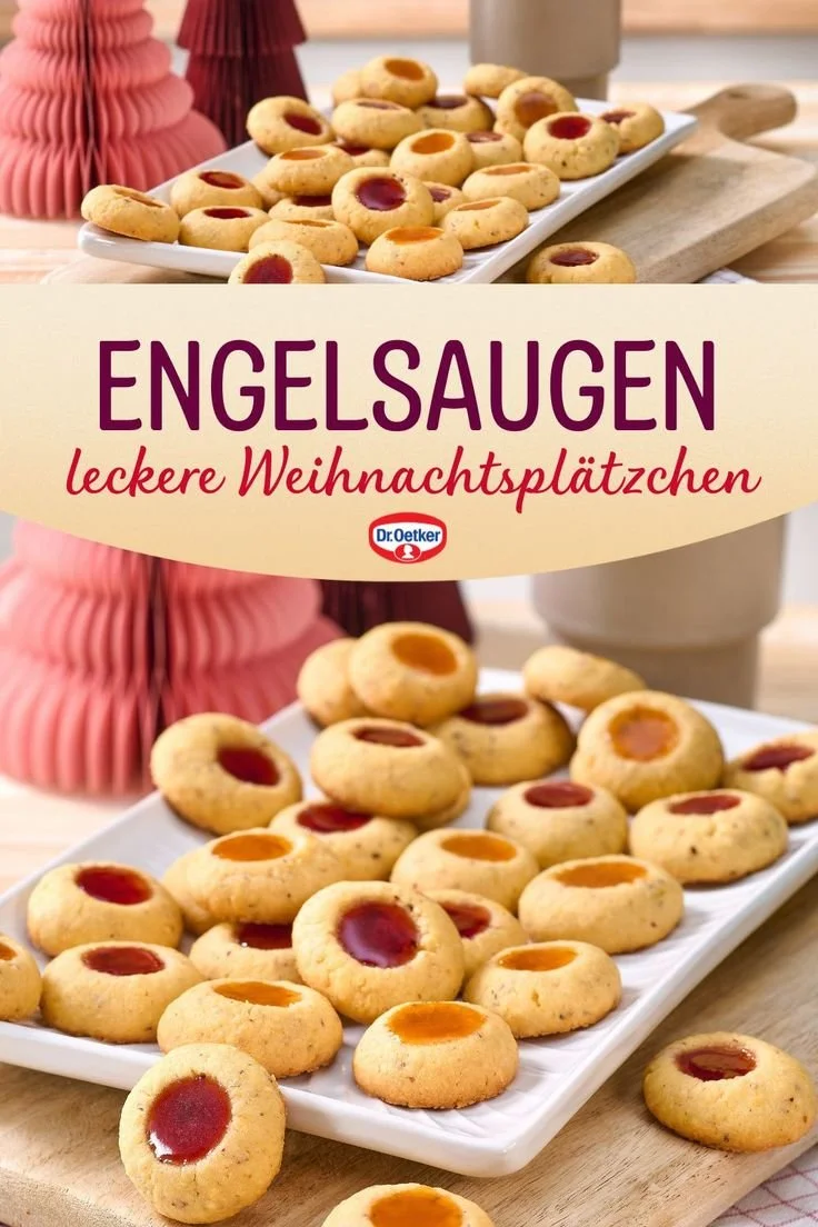 Engelsaugen Weihnachtsplätzchen mit Geleefüllung auf einem festlichen Teller