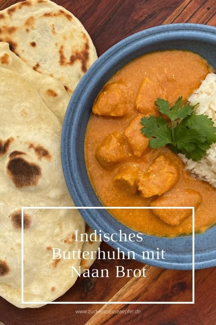 Indisches Butterhuhn serviert mit frisch gebackenem Naan Brot